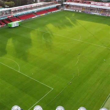 Waar heeft de levensduur van kunstgras mee te maken?